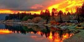 The first thing I did after buying a camper was take in a sunset just outside Sandpoint Idaho on the Pend Oreille River. With the whole place to myself besides a vacant cabin the sky lit up in warm embracing orange tones. The current of the river crawled to an unnoticeable flow turning the surface to a reflective glass. Which mirrored the fiery sky above. With the cabin nestled on the shore surrounded by autumn colored forests it was if nature was congratulating me for buying a camper. Telling me there will be many more sunsets like this in your future. As I sat there in peace reflecting on my new rv purchase I couldn't help, but think this moment was made for me on that day only for that time. It was an odd, but overwhelmingly exciting feeling that I still cherish to this day. Buying a camper showed me the Pend Oreille River in all its glory that day, and helped me discover a town that will surely be a high volume tourist destination in the not too distant future. So get out there and buy a camper today so you too can enjoy the adventures of RV life. 