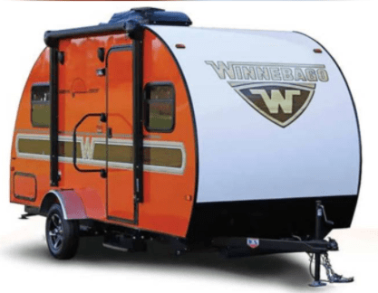 17 foot Winnebago Minnie Drop is a small towable travel trailer camper with a full size shower and bathroom that can be towed by a small sedan.